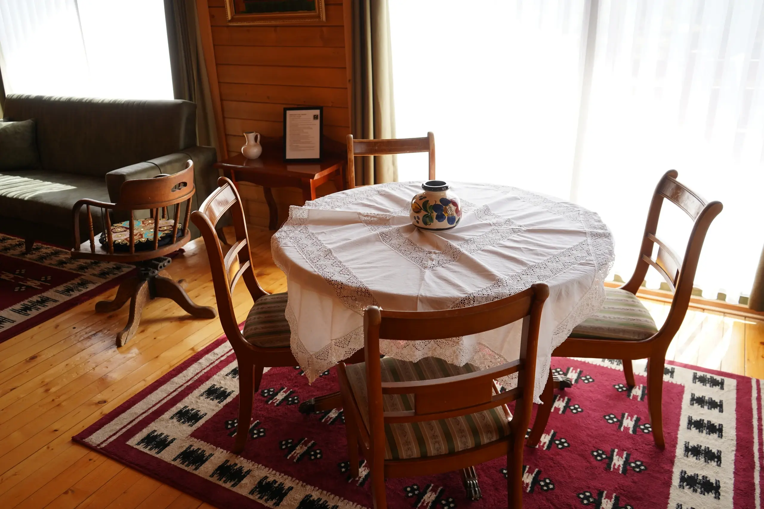 A table laid under the window