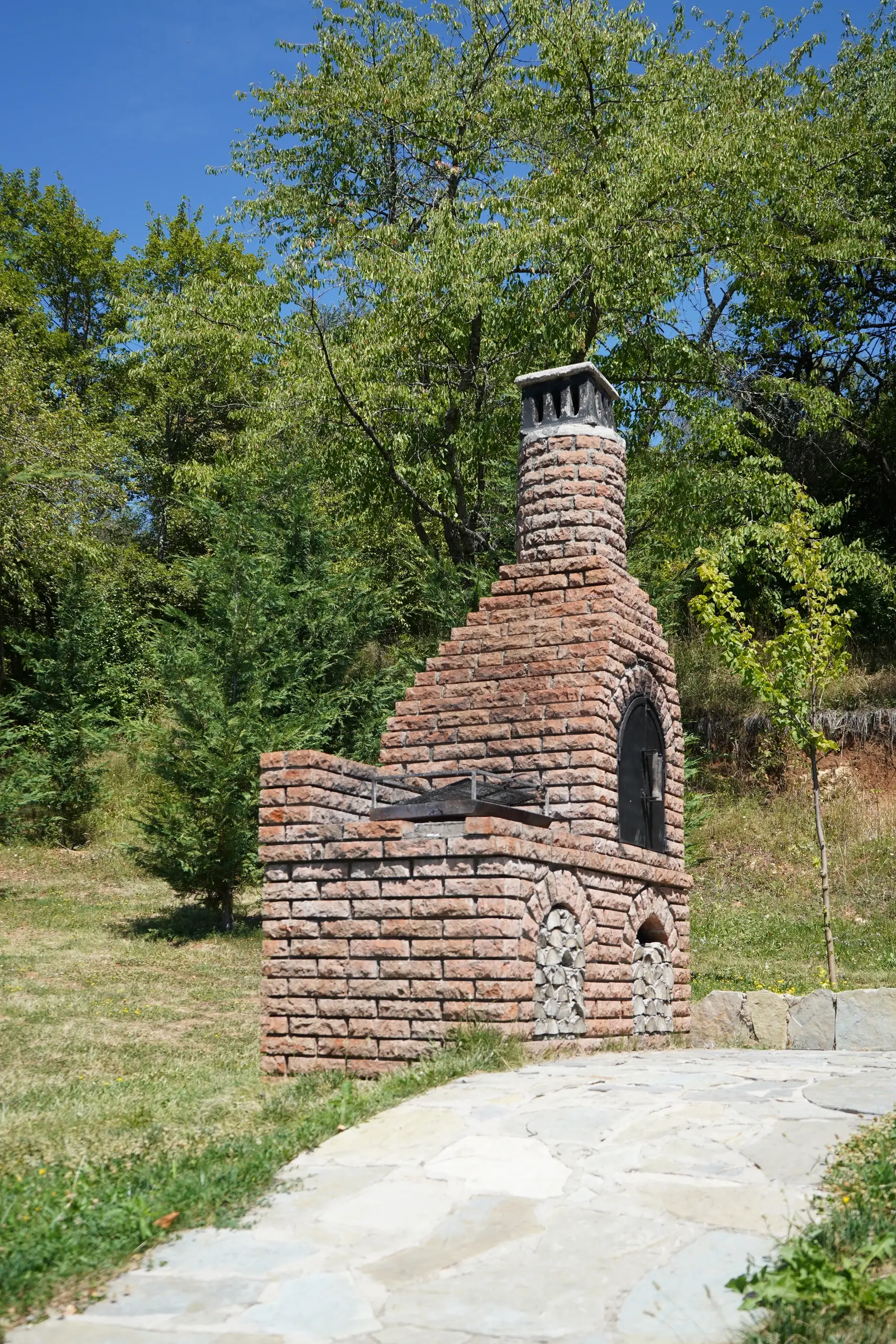 The brick oven and the grill beside it