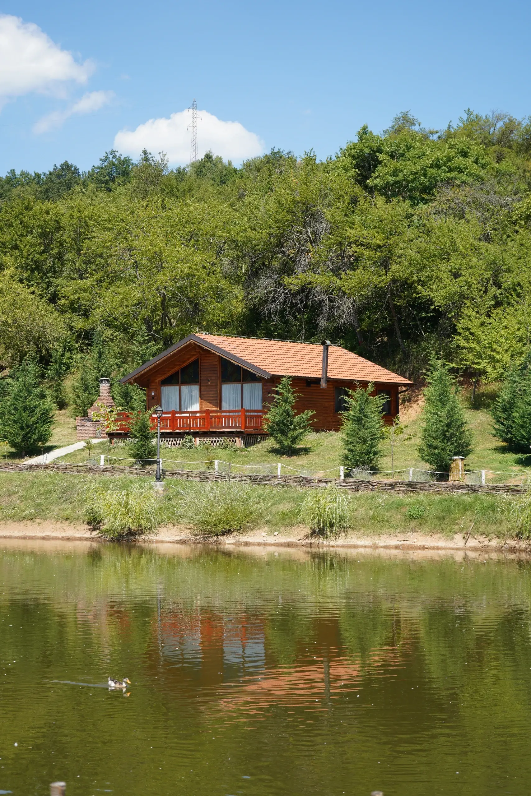A villa mirrored in the still water
